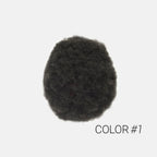 Close-up of Afro Lace hair system French lace base and afro curl texture