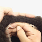 Top view of Afro Lace hair system showing full French lace base and curl pattern